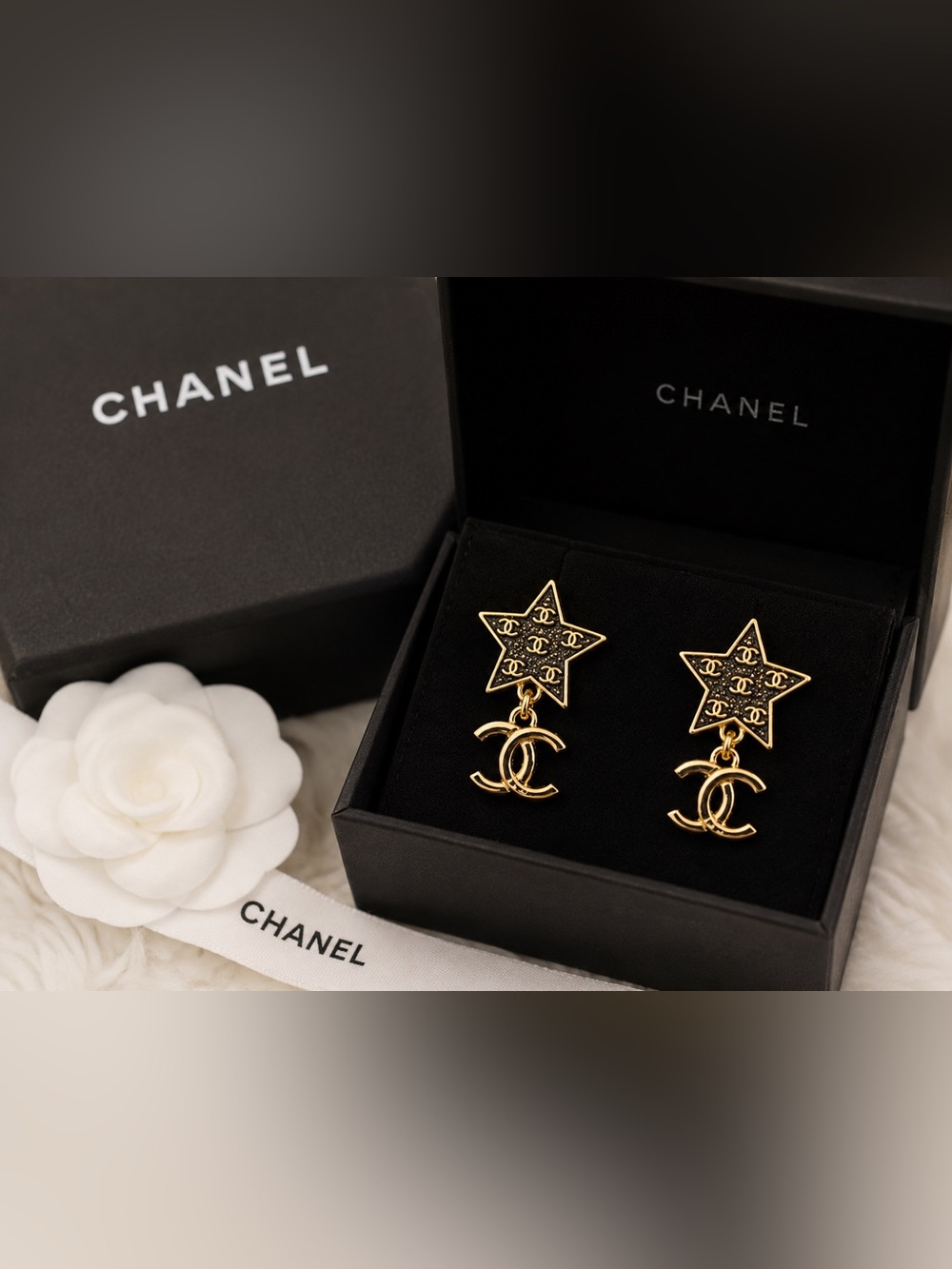CHANEL Gold Star CC Logo Earrings